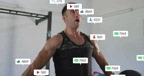 Muscular man performing pull-up with social media engagement overlays, crossfit strength