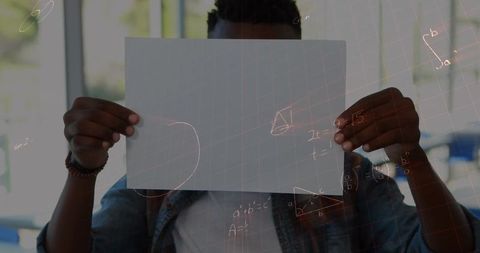 Student Analyzing Document with Mathematical Integrations