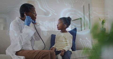 Pediatrician examining child at home with stethoscope and telemedicine digital overlay