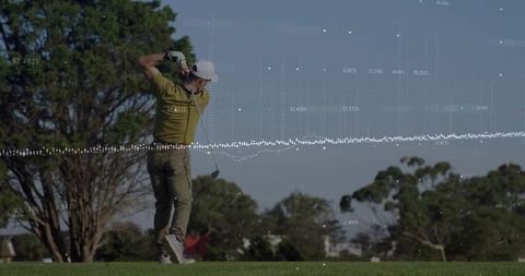 Senior golfer swinging on fairway with data integration