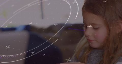 Child Engaging with Technology Amid Digital Interface Overlays