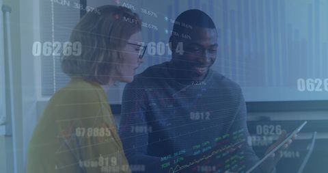 Diverse Team Analyzing Stock Market with Multiple Exposure Effects - Download Free Stock Images Pikwizard.com