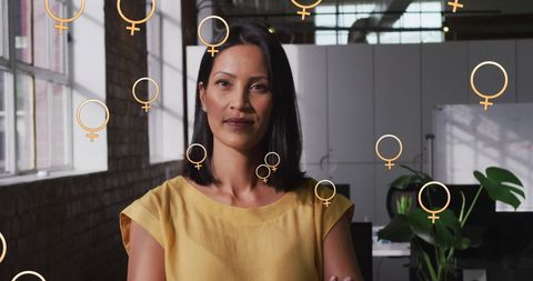 Confident businesswoman empowered with feminist icons