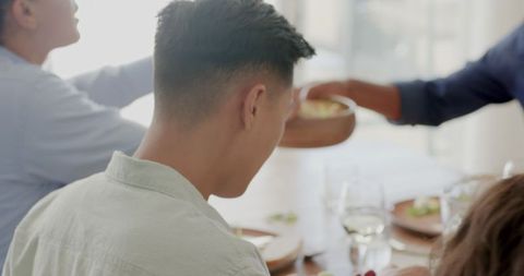 Friends Celebrating Wedding Reception with Dinner