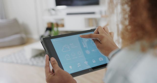 Person Using Tablet for Home Automation Control - Download Free Stock Images Pikwizard.com