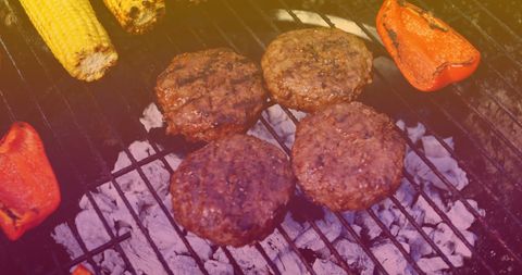 BBQ Grilled Burgers with Veggies Over Charcoal - Download Free Stock Images Pikwizard.com