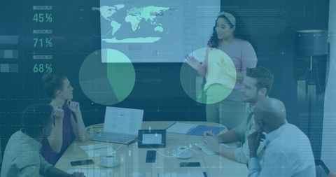 Business Team Analyzing Data in Modern Boardroom During Presentation