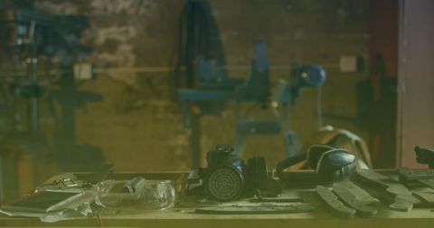 Workshop Tools and Protective Gear on Table