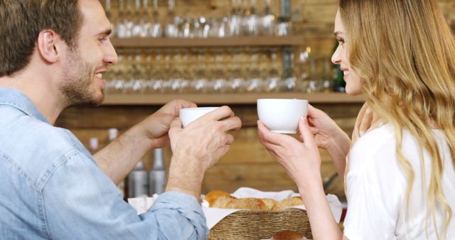 Smiling Couple Enjoying Coffee Date at Cozy Cafe - Download Free Stock Images Pikwizard.com