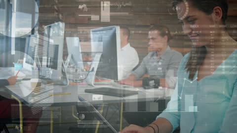 Businesswoman Analyzing Data on Tablet in Technology Office