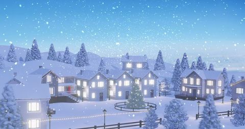 Winter Wonderland Village with Lit Homes and Snow-Covered Landscape