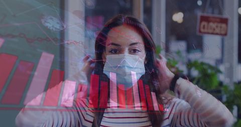 Hairdresser with Mask Amidst Pandemic Data Visualizations