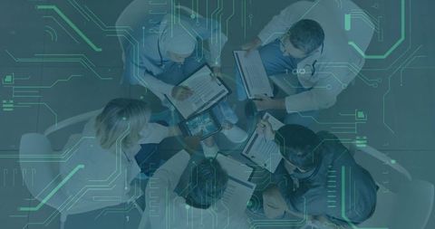 Healthcare Team in Digital Innovation Meeting Analyzing Data