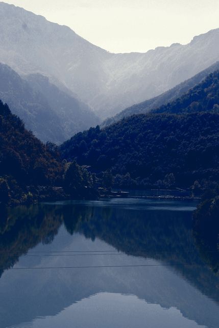 Misty Mountain Lake with Serene Reflection - Download Free Stock Images Pikwizard.com