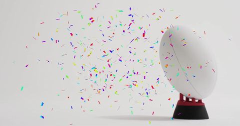 Rugby Ball Surrounded by Colorful Confetti Celebration