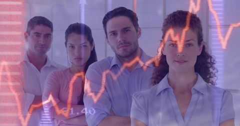 Business team analyzing financial data with overlaid graphs and interactive visualization