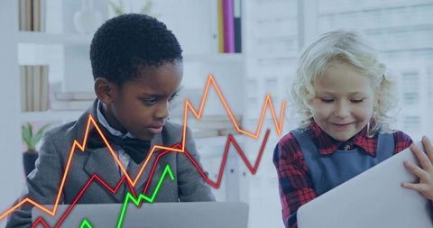 Children Analyzing Data on Laptops in Modern Office Environment