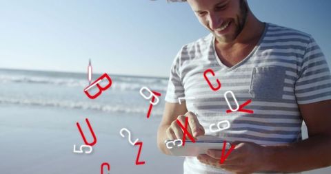 Man Interacting with Digital Interface on Beach