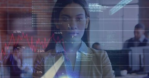 Businesswoman analyzing stocks in modern office with virtual graphs