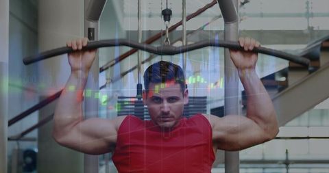 Male athlete performing lat pulldown on cable machine with financial data chart overlay