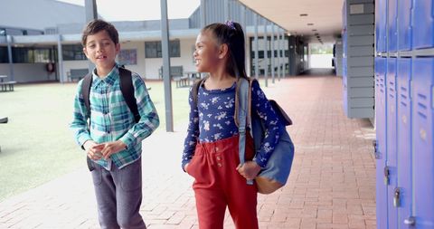 Diverse Students Chatting Happily Near School Lockers - Download Free Stock Images Pikwizard.com