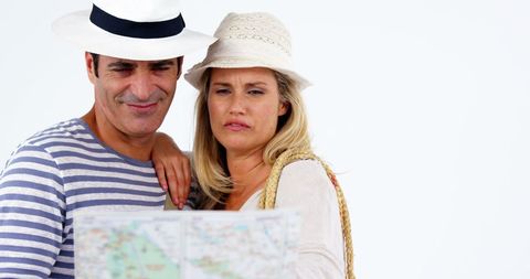 Couple Navigating Map on Vacation