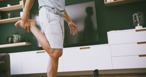 Home yoga practice focusing on flexibility and balance