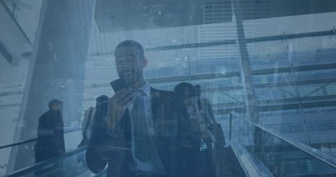 Businessman Communicating Digitally with Financial Graph Overlay