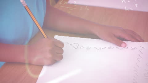 African American Child Creating Art with Math Concepts in School