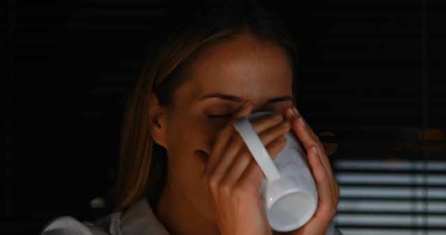 Woman Drinking Coffee Late at Night to Stay Alert - Download Free Stock Images Pikwizard.com