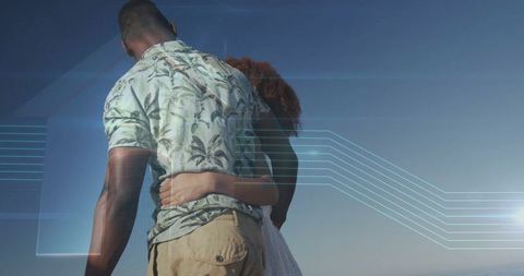 Couple Embracing at Beach with Futuristic Tech Element