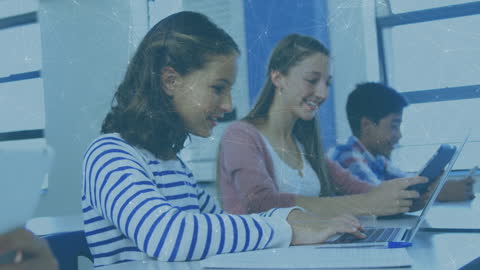 Students Collaborating with Laptops in Classroom