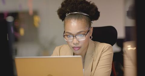 Focused African American Businesswoman Working on Laptop in Office - Download Free Stock Images Pikwizard.com
