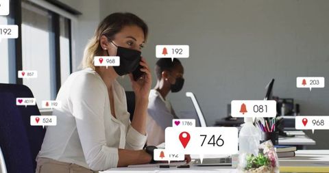 Busy office with notifications highlighting digital connectivity