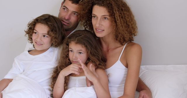 Family Relaxing in Bed Together Start Of The Day - Download Free Stock Images Pikwizard.com