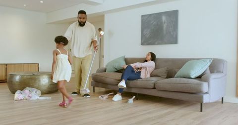 Family working together on home cleanup