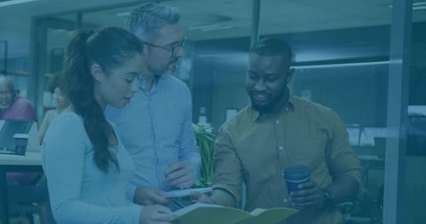 Diverse team collaboration in modern office with focus on teamwork