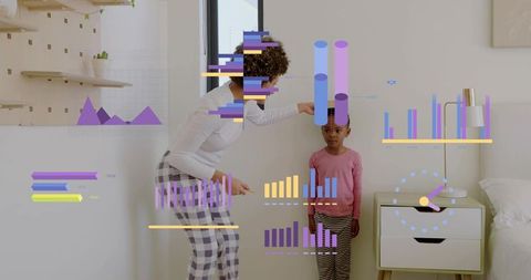Caregiver guiding child by wall with augmented reality data overlays for learning and growth