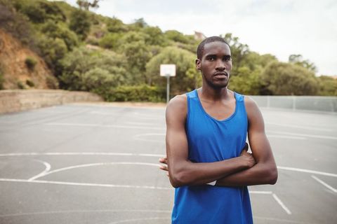 Confident Basketball Player in Urban Outdoor Court