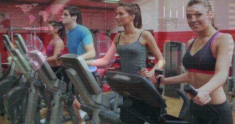 Group Cardio Session on Ellipticals in Modern Gym Setting