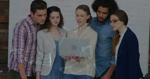 Creative Team Engaged in Collaborative Project with Digital Network Overlay