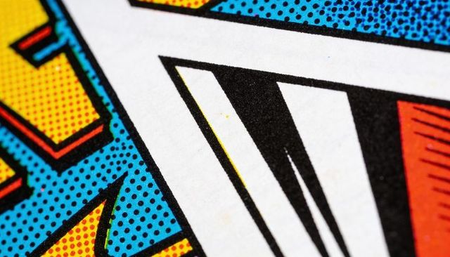 Macro halftone comic print featuring bold geometric color blocks and black-striped panel