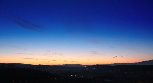 Peaceful Twilight Over Hilly Countryside - Download Free Stock Photos Pikwizard.com