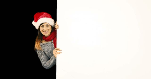 Woman in Santa Hat Holding Blank White Board - Download Free Stock Images Pikwizard.com