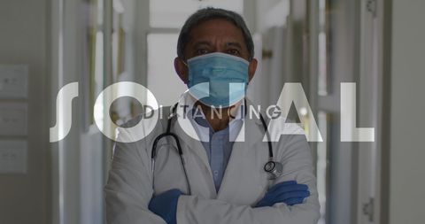 Male Doctor Promoting Social Distancing During Pandemic