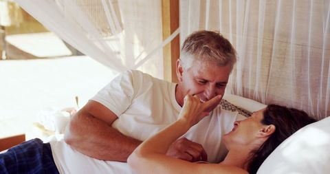 Middle-aged Couple Sharing a Tender Moment in Cozy Retreat - Download Free Stock Images Pikwizard.com