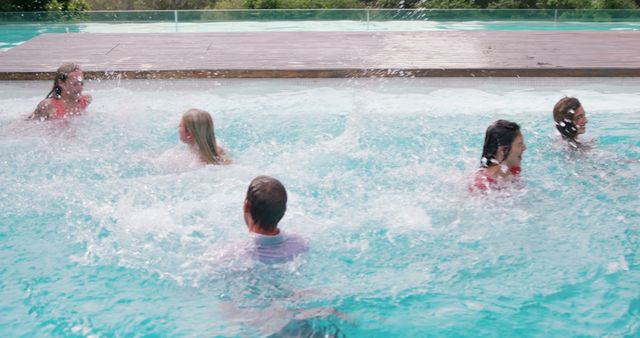 Group of Friends Having Fun in Swimming Pool on Sunny Day - Download Free Stock Images Pikwizard.com