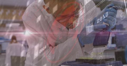 Scientist Engaged in Precise Liquid Transfer to Microplate