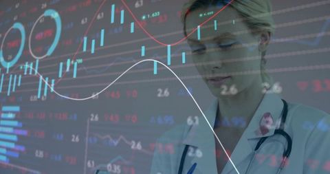 Doctor analyzing healthcare analytics dashboard with holographic financial data overlay
