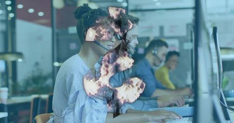 Call center team typing with headsets and burnt paper overlay for customer service concept